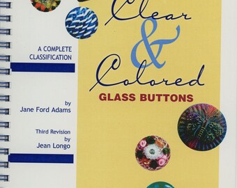 Clear and Colored Glass Buttons 2002 edition Jane Ford Adams third Revision by Jean Longo 6 x 9"Prepared for NBS Great Quick guide 30 pages