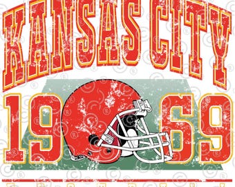 May include: Vintage-style graphic with the text "Kansas City 1969 Football" in red and yellow lettering with a distressed effect. A red football helmet with a white facemask is centered in the graphic.