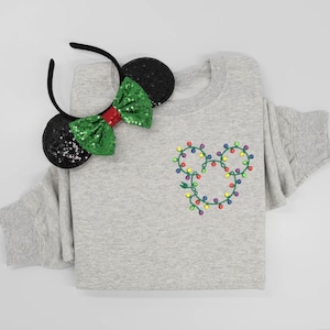 Sudadera de cuello redondo bordada con luces navideñas de Mickey