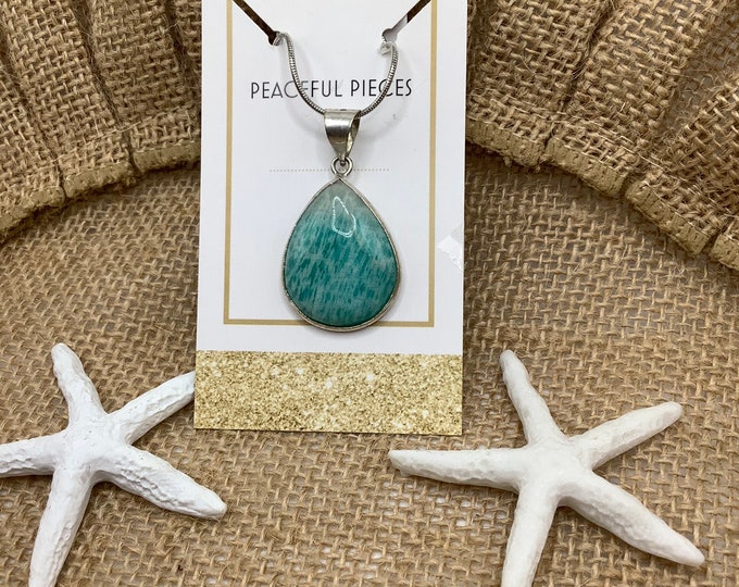 Healing Amazonite pendant known for its properties to help with health, protection,vitality,confidence, happiness, and calmness.