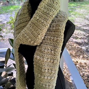 Neutral textured crochet scarf.