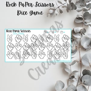 May include: A sticker sheet with the text "Rock Paper Scissors Dice Game" at the top. The sheet features illustrations of hands in the rock, paper, and scissors gestures. The hands are outlined in black on a white background.