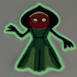 Flatswood Monster Cryptid Cryptozoology inspired patch glow in the dark features iron on