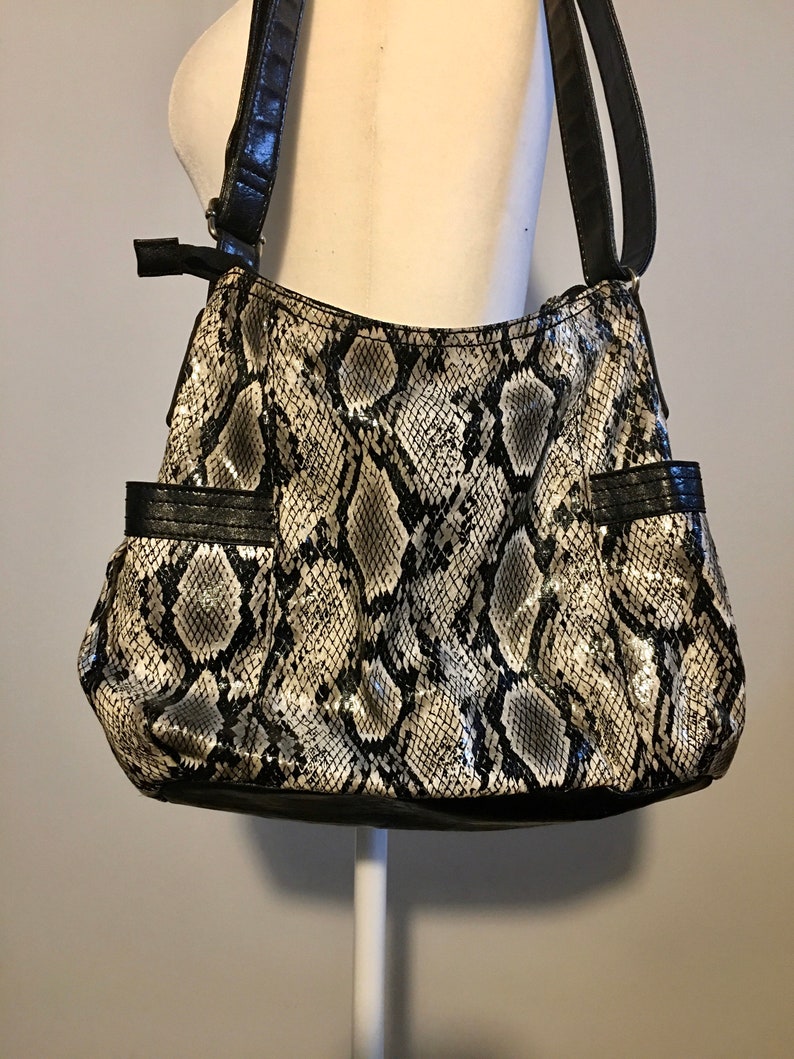 black and leopard print purse