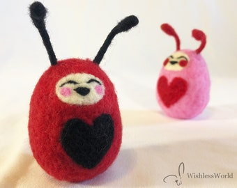 Cabezas de huevo tambaleantes - Love Bug