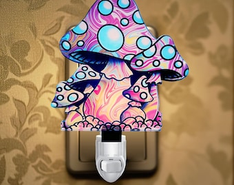 May include: A colorful night light shaped like a mushroom with a swirl pattern. The night light is plugged into a standard electrical outlet.