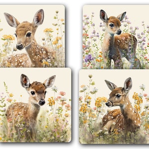 May include: Four square coasters featuring a fawn with white spots standing in a field of wildflowers. The fawn is looking at the viewer in each image. The background is a soft cream color.
