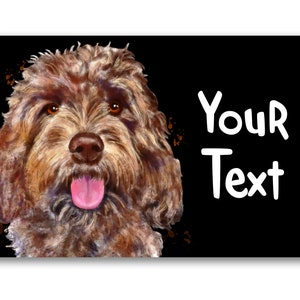 May include: A brown and white doodle dog with its tongue sticking out. The dog is looking directly at the camera. The background is black with the text "Your Text" in white.