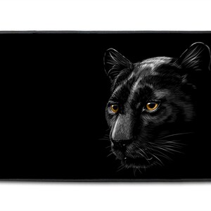 May include: A black panther with bright yellow eyes is depicted in a close-up illustration against a black background.