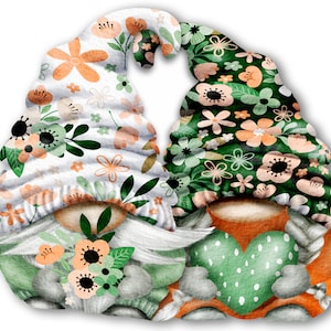 May include: Two gnomes with floral hats and beards, one holding a green heart. The gnome on the left has a white hat with orange and green flowers, and the gnome on the right has a green hat with orange and white flowers.