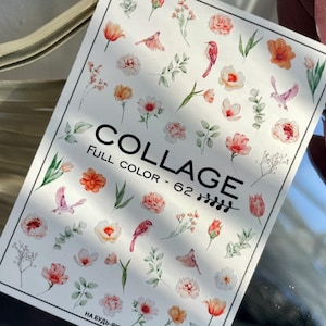 May include: A sheet of nail art stickers featuring a floral and bird design. The stickers are white with pink, red, and orange flowers and birds. The sheet reads "COLLAGE FULL COLOR - 62" and "НА БУДЬ-ЯКИЙ ФОН/APPLIED ON ANY BASE".
