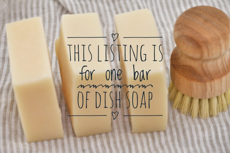May include: Image of three rectangular bars of dish soap with a wooden handled brush. The text on the soap reads: "THIS LISTING IS for one bar OF DISH SOAP". The soap is light yellow and the brush has light brown bristles.