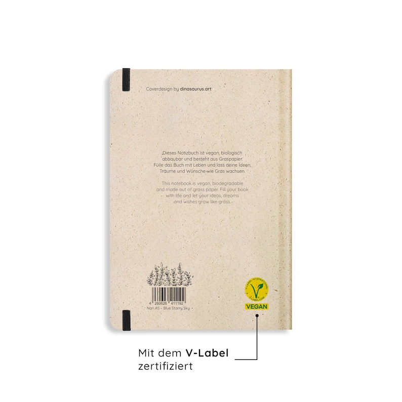 May include: A beige notebook with the text "Coverdesign by dinosaurus.art" and a "VEGAN" label. The notebook is made of grass paper and has text in English and German. The text describes the notebook as vegan and biodegradable.