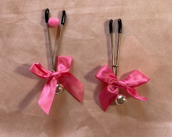 Pink ribbon tweezers nipple clamps in nipple jewelry without piercing.