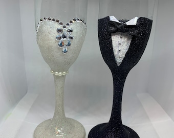 Wedding champagne toasting flutes for bride and groom.