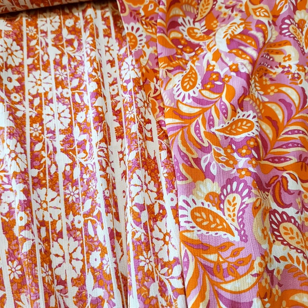 Viskose-Crepe mit Blätter und Blumen, rosa-orange, 2 Designs, Sommerfarben - 0,5mtr