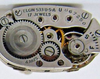 Gemelos de plata de ley con mecanismo de reloj Elgin