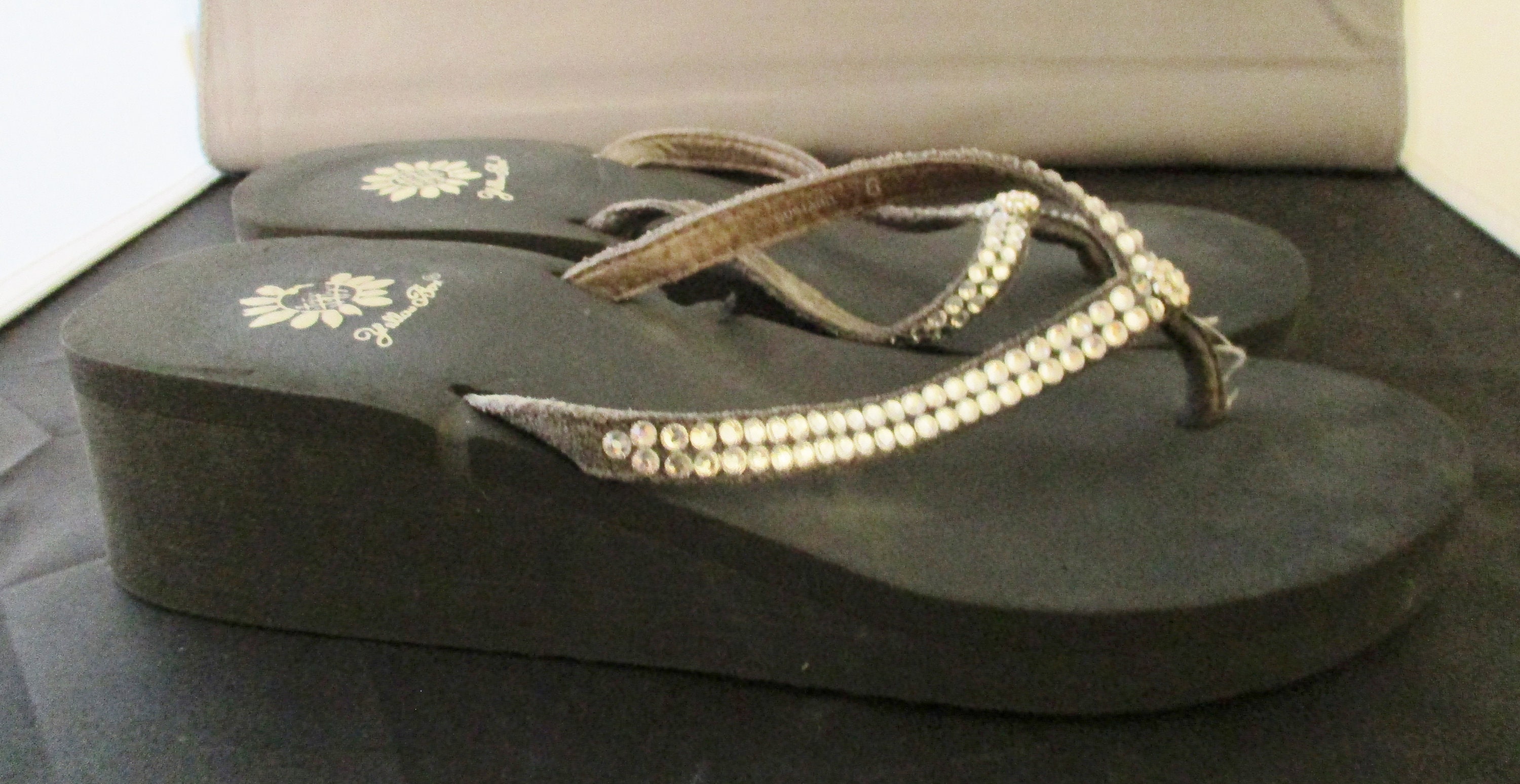 white yellow box flip flops