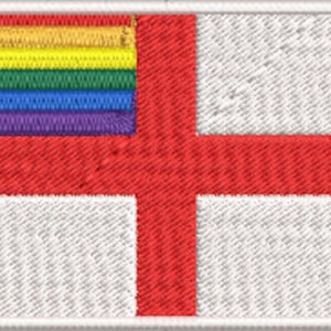 May include: A white flag with a red cross, overlaid with a rainbow stripe in the top left corner. The rainbow stripe is made up of red, orange, yellow, green, blue, indigo, and violet.