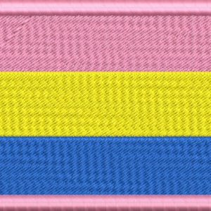 May include: A pink, yellow and blue horizontal striped patch with a pink border.