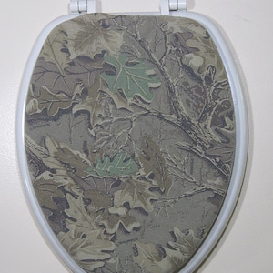 Toilet Seat Lid Cover, for standard size toilet seat. Cotton blend earthy camouflage. Leaves tree branches camo. Fun bathroom idea. Recycled
