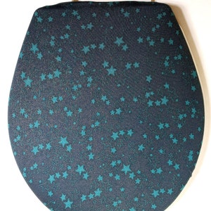 Fun Toilet lid Covers For standard size toilet seat. Easy decorating idea. Stretchy cloth toilet seat lid cover. Turquoise green stars.