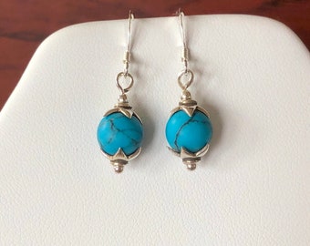 Sterling silver Earrings with turquoise bead and spiky bead caps