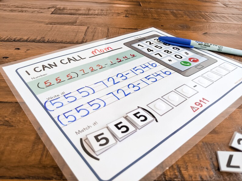 May include: A printable worksheet for learning to dial a phone number. The worksheet has a picture of a cell phone with a number pad and a section for writing the phone number. The number is (555) 723-1546. The worksheet also has a section for matching the numbers with the phone pad.