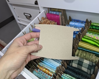 Carretes de cinta de aglomerado: una solución para almacenar encajes