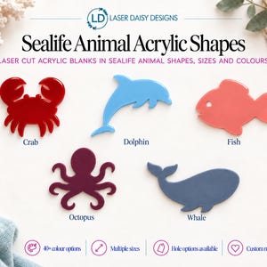 May include: Laser cut acrylic shapes in various sea life designs including a red crab, light blue dolphin, coral fish, dark purple octopus, and blue whale. The text reads Laser Daisy Designs, Sealife Animal Acrylic Shapes, and Laser cut acrylic blanks in sealife animal shapes, sizes and colours.