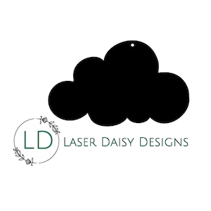 May include: A solid black cloud-shaped cutout with a small circular hole at the top for hanging. Below the cloud, a circular logo features the letters LD surrounded by a thin wreath, followed by the text LASER DAISY DESIGNS in green.