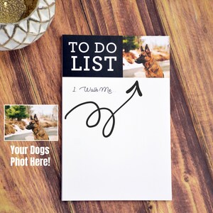 May include: A white to-do list notepad with a black border and the words "To Do List" in black text. The notepad has a photo of a German Shepherd dog at the top and the words "Walk Me" written on the notepad.