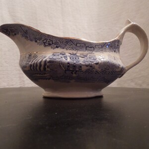 Antique blue willow large gravy boat
