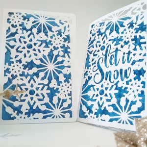 Conjunto de 2 plantillas SVG de copos de nieve para tarjetas de invierno, tarjetas navideñas cortadas con láser, archivos de corte Cricut, tema de Frozen, fiesta, silueta, cameo, adorno de copo de nieve AI