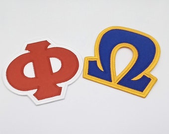 May include: Two embroidered patches, one red with the Greek letter Phi and one blue with the Greek letter Omega, both with a yellow outline.