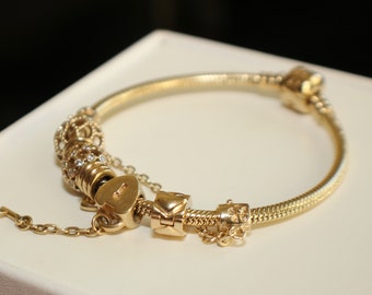 solid gold charm bracelet