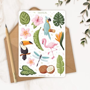 May include: A rectangular sticker sheet labelled TROPICAL featuring illustrations of a toucan, a flamingo, a blue parrot, a dragonfly, a coconut, and various tropical flowers and green leaves. The sheet includes small geometric shapes and text.
