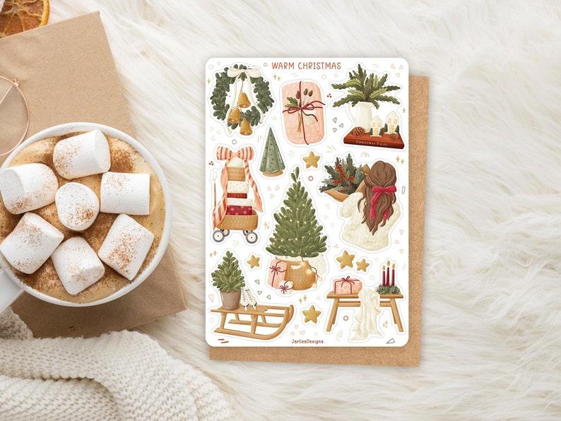 May include: A sticker sheet titled WARM CHRISTMAS featuring illustrations of a wreath with gold bells, wrapped gifts, a pine tree, a person with a red hair bow, a wooden sled, and holiday decor. The stickers are arranged on a white rectangular backing.