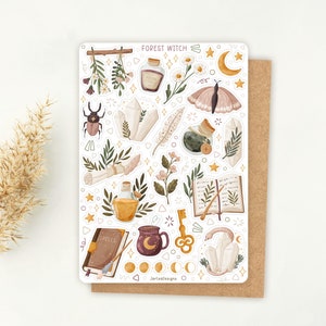 May include: A sticker sheet titled Forest Witch featuring illustrations of crystals, a moth, a beetle, a spellbook, a potion bottle, a key, a mug with a moon, flowers, and moon phases. The sheet includes various small star and geometric shapes.