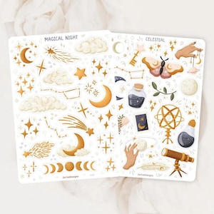 Puede incluir: Dos hojas de pegatinas etiquetadas como MAGICAL NIGHT y CELESTIAL con ilustraciones doradas y marrones de lunas crecientes, estrellas, estrellas fugaces, nubes, una polilla, un telescopio, un globo terr&aacute;queo, frascos y manos con objetos.