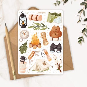 May include: A sticker sheet titled CAMPING featuring illustrations of a black lantern, rolled sleeping bag, green map, compass, campfire, rope, brown backpack, oak leaf, pocket knife, flashlight, binoculars, tent, thermos, and marshmallows.