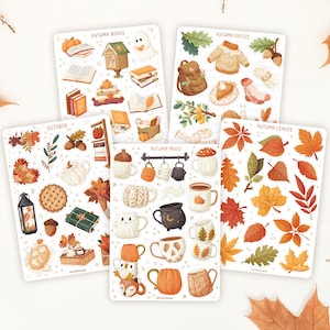 May include: Five sticker sheets featuring autumn-themed illustrations including books, pumpkins, ghosts, jumpers, mugs, and various fall leaves in shades of orange, brown, and green. Each sheet is labelled with titles like Autumn Books, Autumn Breeze, October, Autumn Mugs, and Autumn Leaves.