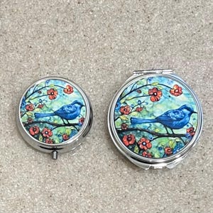 Estuche para pastillas o joyero con forma de pájaro azul
