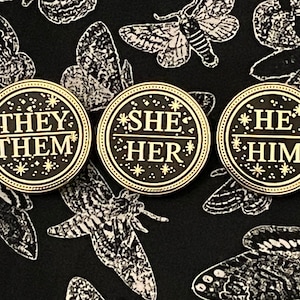 Black and Gold Circle Pronoun Pin 1.25”