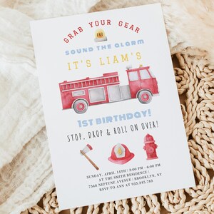 May include: A white rectangular birthday invitation card featuring a red fire truck illustration, a yellow siren, an axe, a red helmet, and a red fire hydrant. The text reads: GRAB YOUR GEAR, SOUND THE ALARM, IT'S LIAM'S 1ST BIRTHDAY, STOP, DROP & ROLL ON OVER!