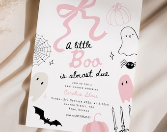 May include: A Halloween-themed baby shower invitation. The card features the text "a little Boo is almost due" in pink, with illustrations of ghosts, a spiderweb, and a bat. The invitation is set against a white background.
