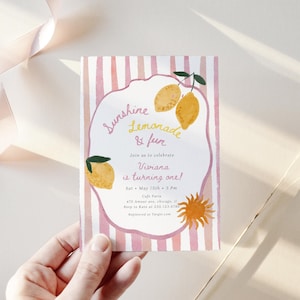 May include: A watercolour invitation with pink and white stripes, featuring lemons and the text "Sunshine, Lemonade & fun". The invitation is for Viviana's first birthday, with details including the date, time, and location.