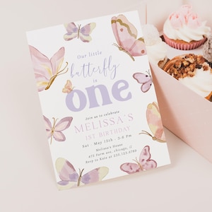 May include: A light-colored invitation with watercolor butterflies and the text "Our little butterfly is one." The invitation is for Melissa's 1st birthday, with date, time, and location details.