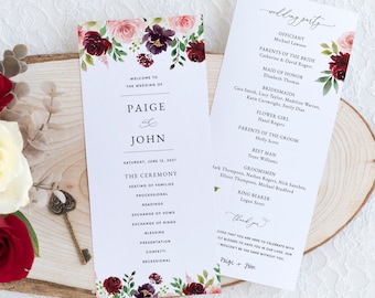 May include: Wedding ceremony program with a floral design featuring burgundy, pink, and purple flowers. The program lists the order of events for the wedding ceremony, including the seating of families, processional, readings, exchange of vows, exchange of rings, blessing, presentation, confetti, and recessional. The program also includes the names of the wedding party, including the officiant, maid of honor, bridesmaids, flower girl, best man, and groomsmen.