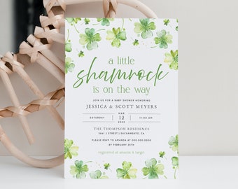 May include: A baby shower invitation with a watercolor shamrock design. The invitation reads "a little shamrock is on the way" and includes the names Jessica & Scott Meyers, the date Saturday, March 12, 20XX, the time 11:00 AM, the location The Thompson Residence, 5641 J Street | Sacramento, CA, and the RSVP information.
